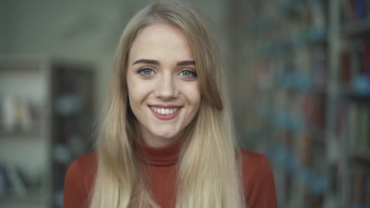 Girl Smiling Portrait In The Library 4756 Medium
